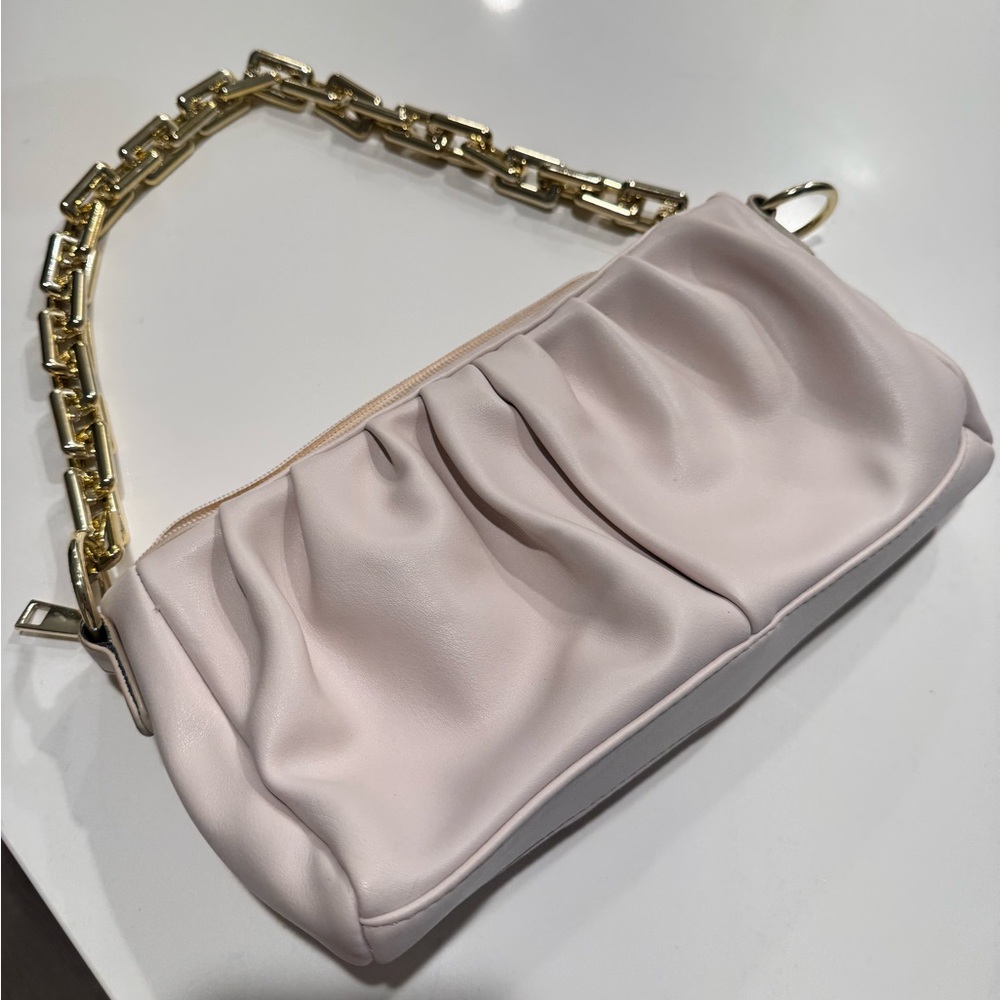 White purse with gold chain